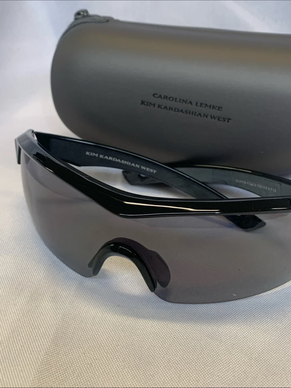 Sleek Black Sunglasses with Hard Zipper Case